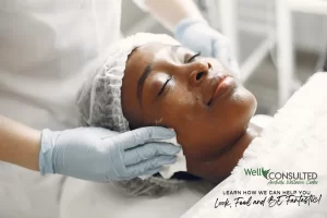 African American woman receiving facial spa treatment
